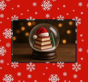 bola de nieve repleta de libros sobre los que hay un gorro de papá noel